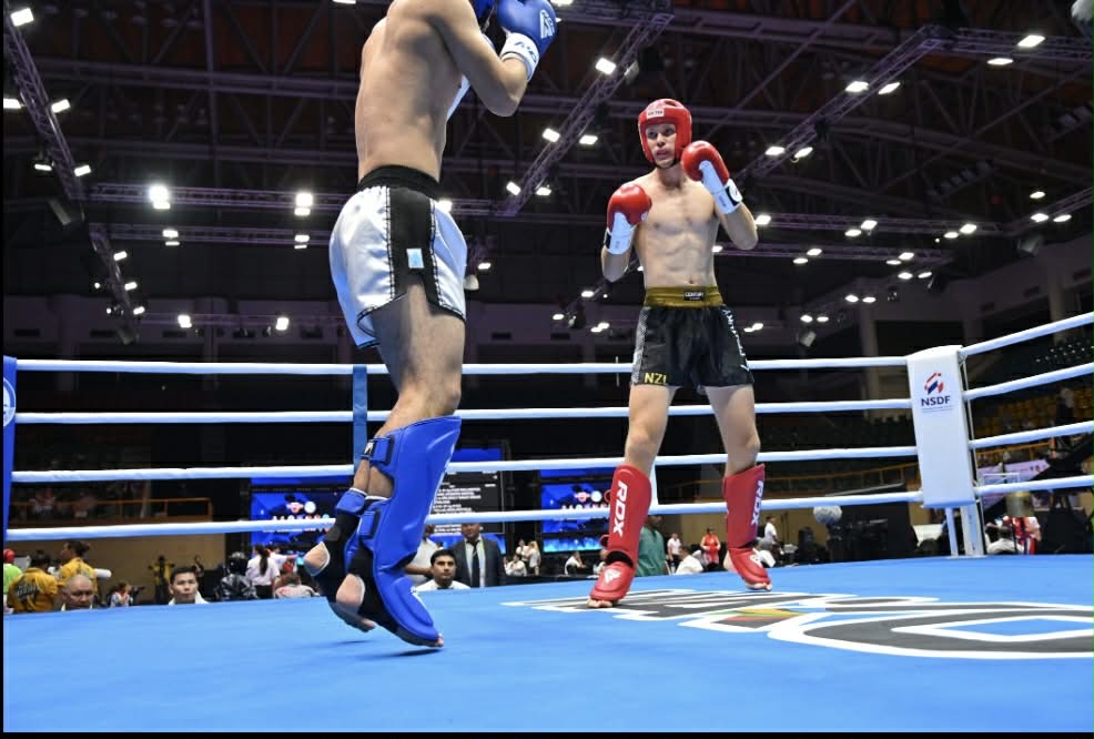 Oceania kickboxers competing in the ring